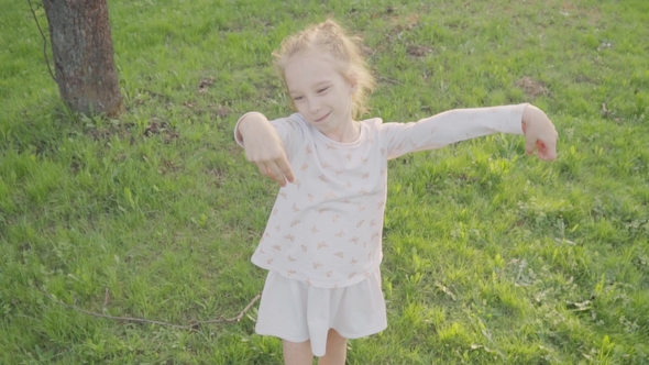 Beautiful Young Lady Smiling in the Park. Beautiful Nature.