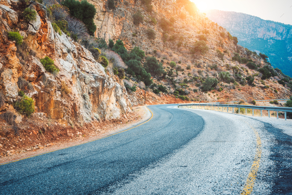 Mountain road at sunset in Europe. Landscape - Stock Photo - Images