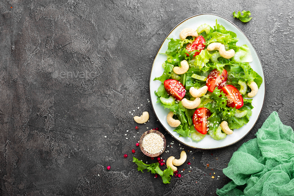Salad with fresh vegetables and nuts - Stock Photo - Images