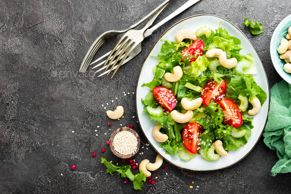 Salad with fresh vegetables and nuts - Stock Photo - Images
