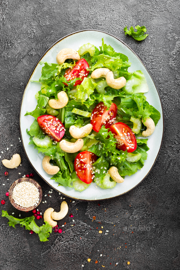 Salad with fresh vegetables and nuts - Stock Photo - Images