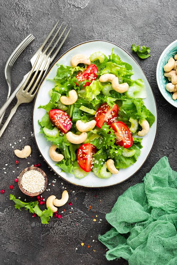 Salad with fresh vegetables and nuts - Stock Photo - Images