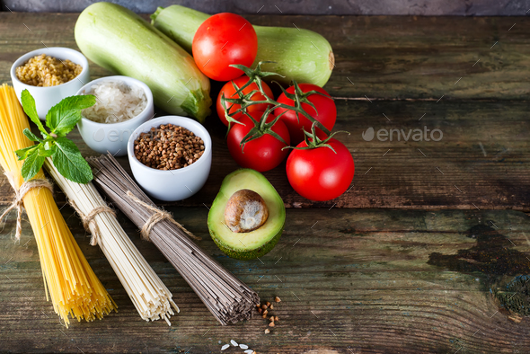 bunch of Italian spaghetti, noodles soba and somen, avocado, zucchini with tomato - Stock Photo - Images