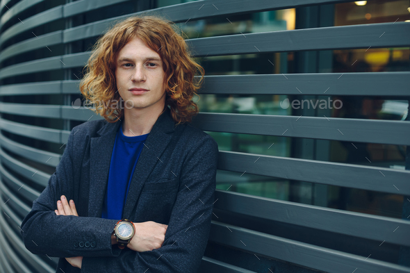 Fashionable man portrait over urban futuristic background - Stock Photo - Images
