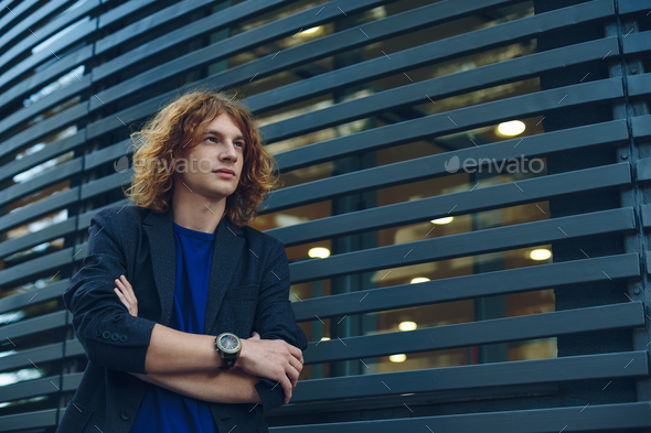Model man with reddish curly hair - Stock Photo - Images