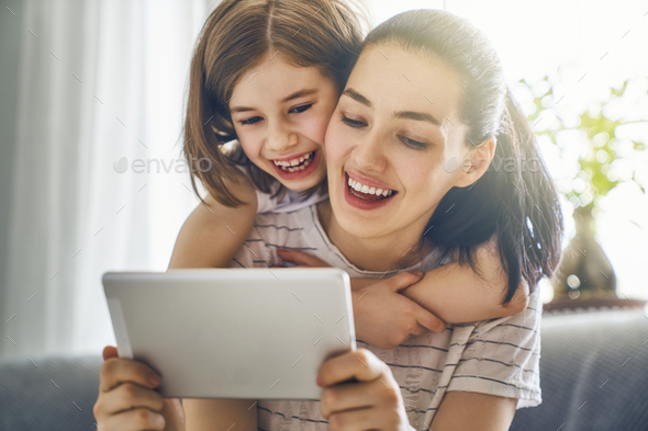 mom and child with tablet - Stock Photo - Images