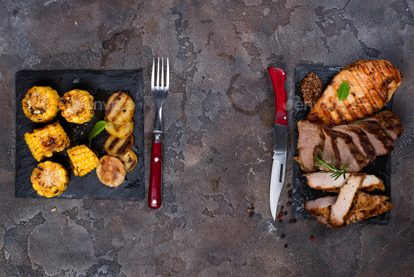 Fresh three types of grilled steak on slate plate with herbs - Stock Photo - Images