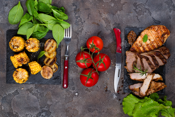 Fresh three types of grilled steak on slate plate with herbs - Stock Photo - Images