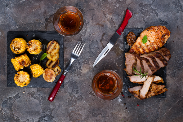 Fresh three types of grilled steak (chicken, pork, beef) on slate plate - Stock Photo - Images