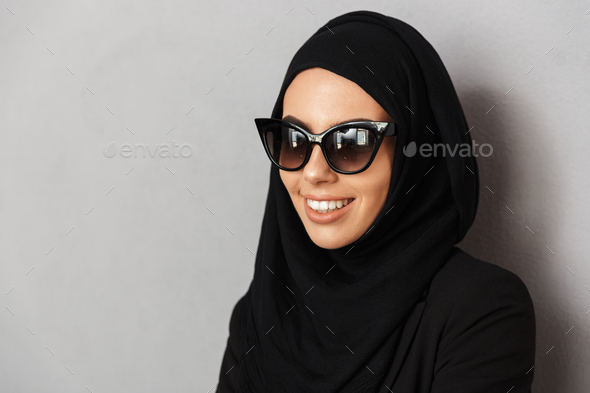 Portrait closeup of muslim fashion woman 20s in religious headsc Stock Photo by vadymvdrobot