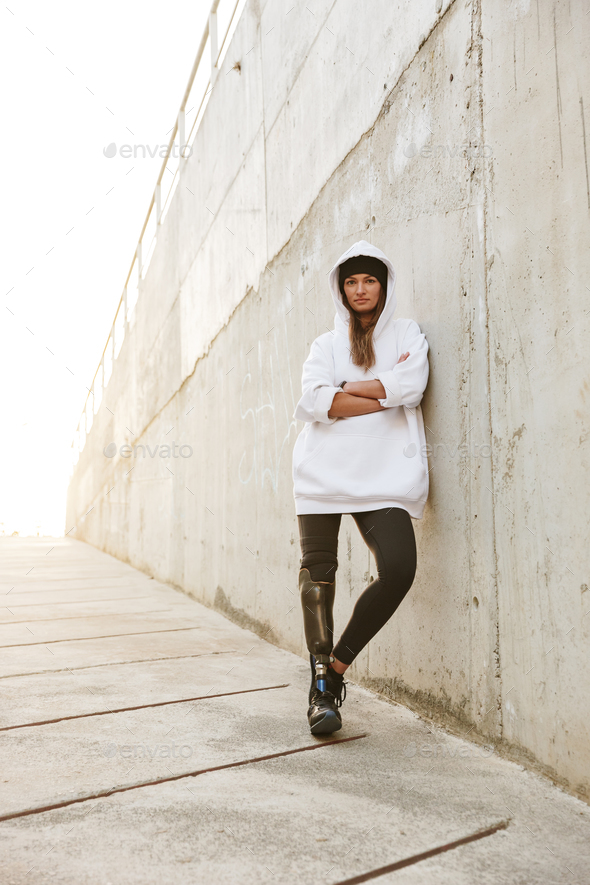 Photo of serious young handicapped woman having bionic leg in st Stock Photo by vadymvdrobot