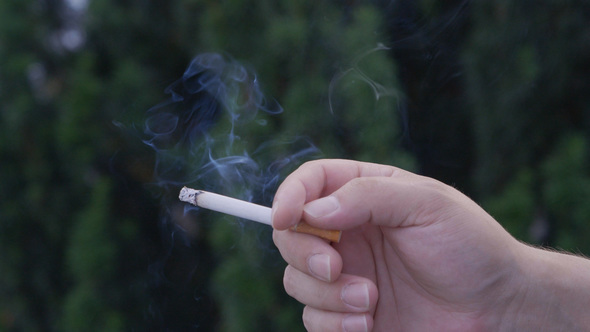 Young man smoking Cigarette 