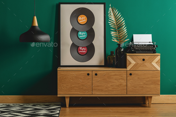 Typewriter and decoration on sideboard - Stock Photo - Images
