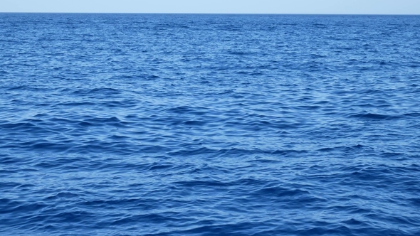 Blue Water Surface on Sea with Small Waves From the Wind