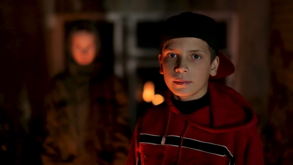 Young Boys' Gang Playing By the Fire at Night alt