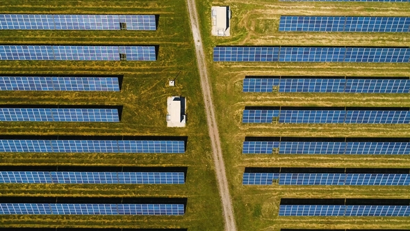 Areal Flight Over Solar Panels. alt