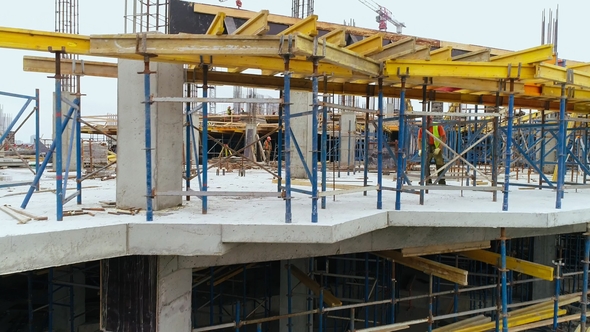 Scaffold Between Floors and Interior Partitions in Construction Building Aerial View alt