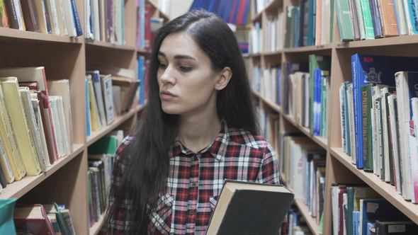 Student Girl Walking in the Library