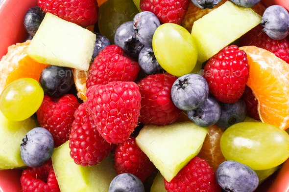 Fresh prepared fruit salad as background, healthy nutrition concept - Stock Photo - Images