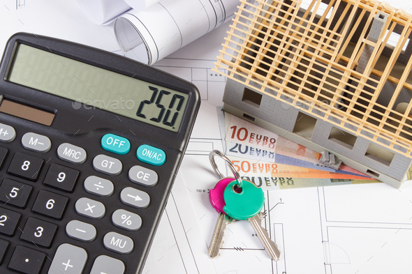 House under construction, keys, calculator and currencies euro on electrical drawings and diagrams - Stock Photo - Images