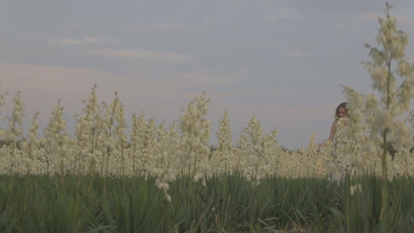 Girl in a Field Smiling Emotions Hands Dancing Ears Laughs