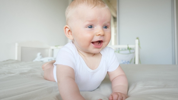 Laughing Blue Eyed Baby alt