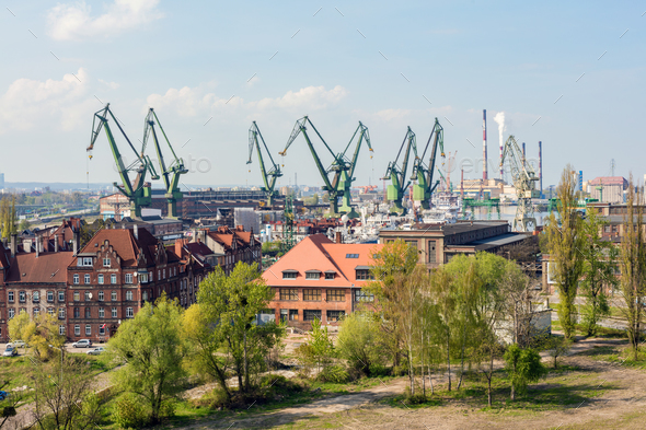 GDANSK, POLAND, May 14, 2018: A view of Gdansk shipyard and the green cranes. - Stock Photo - Images