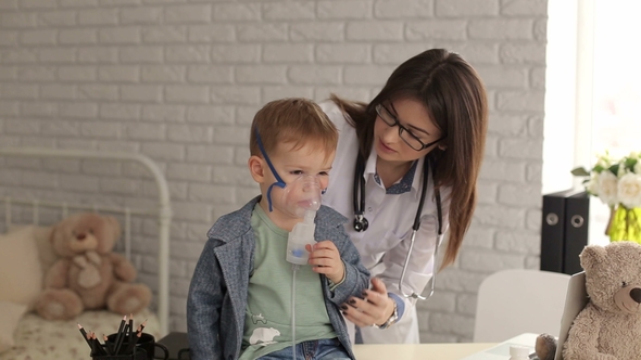 Portrait of Doctor and Child with Inhalation Mask alt