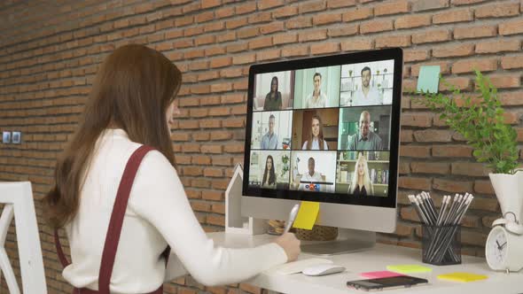 Asian woman talking to multi ethnic group of business people working from home and office alt