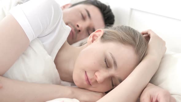 Close Up of Sleeping Young Couple alt