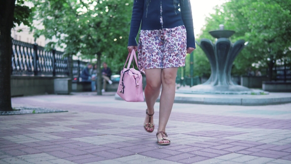 Legs The Girl Is Walking Around the City