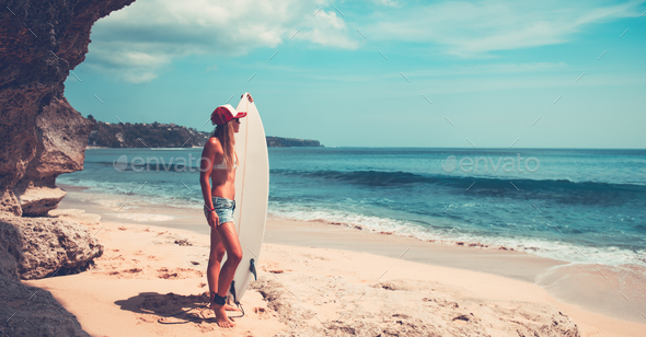 Sportive woman with surfboard - Stock Photo - Images