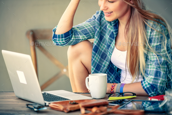 Freelancer working in outdoors cafe - Stock Photo - Images