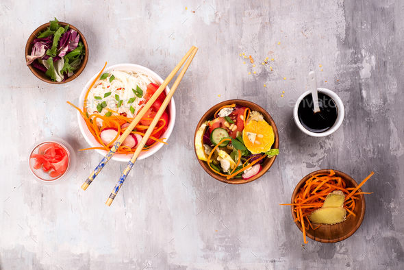 Spicy glass noodles with vegetables - carrots, cucumber, peppers, garlic. - Stock Photo - Images