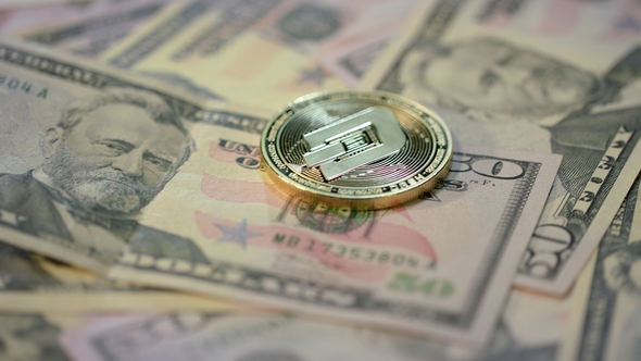 Dash Cryptocurrency Business. Golden Dash Coin Lie on Dollar Banknotes alt