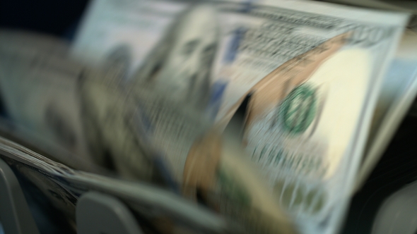 Currency Counting Machine Counting Dollar Banknotes. Money Counting Equipment alt