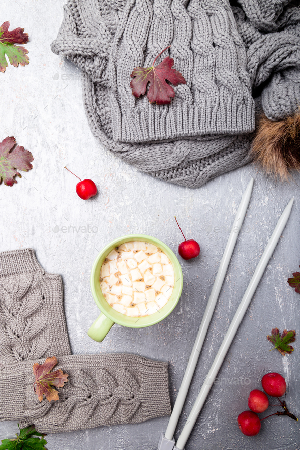 Grey knitting gloves, scarf, hat and needles - Stock Photo - Images