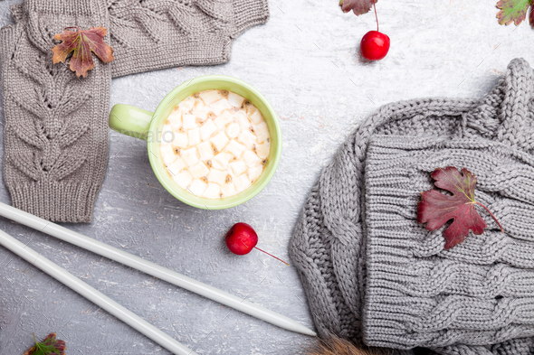 Grey knitting gloves, scarf, hat and needles - Stock Photo - Images