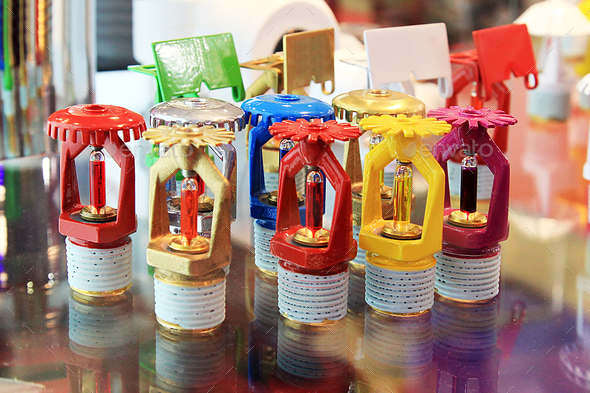 Sprinklers of different colors - Stock Photo - Images