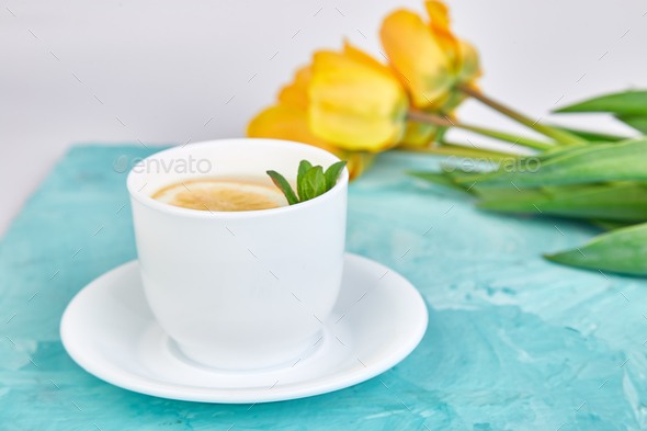 White cup of tea with lemon - Stock Photo - Images