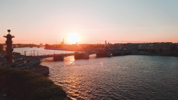 Aerial View of Sunset Over Neva River and Rostral Columns in Saint Petersburg, Russia. Vasilievskiy