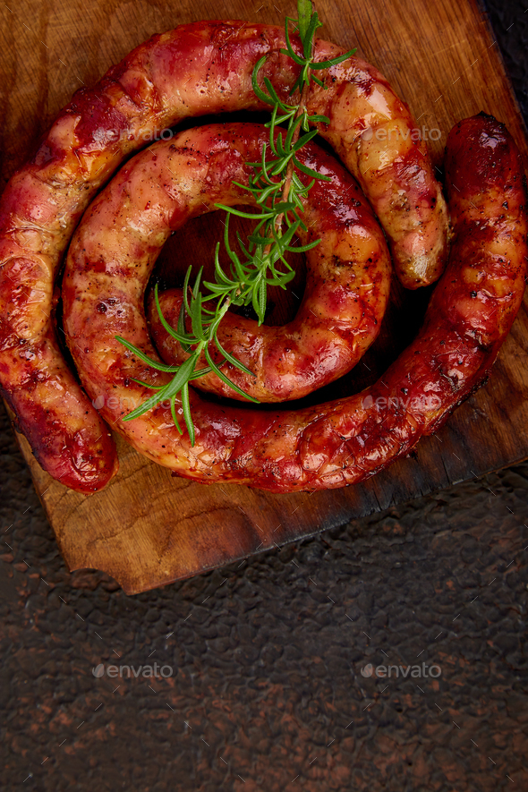 Grilled or Roasted spiral pork sausages - Stock Photo - Images