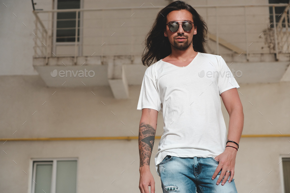 Stylish bearded man posing stylish sunglasses - Stock Photo - Images