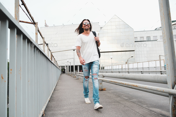Happy man walking in the city Stock Photo by arthurhidden | PhotoDune