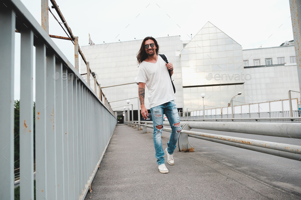 Happy man walking in the city Stock Photo by arthurhidden | PhotoDune