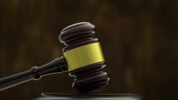 Wooden Hammer Revolves . Black Background alt