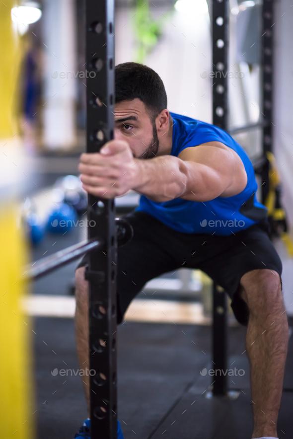 man doing pull ups on the vertical bar Stock Photo by dotshock | PhotoDune