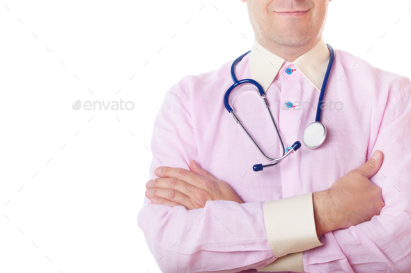 Doctor with a stethoscope stands with crossed arms on white back - Stock Photo - Images