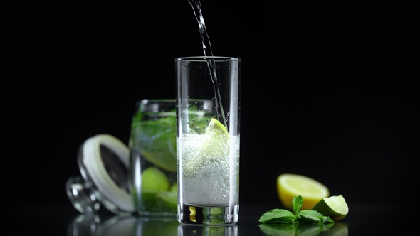 Lemonade with Lime Lemon Mint in Cold Sparkling Soda Water Refreshing Non Alcoholic Mojito Cocktail alt