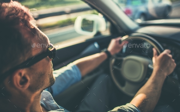 Men Behind the Steering Wheel - Stock Photo - Images